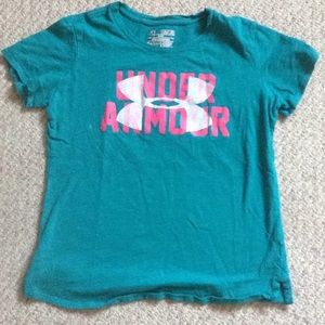 A turquoise under Armour tee